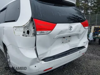 2014 Toyota Sienna XLE with VIN 5TDYK3DC2ES485846, listed as a IAAI auction lot 41693092 with 106,156 mi miles and . Bid and sale history available at DreamBid. Image 6.