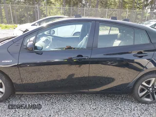 2021 Toyota Prius L Eco with VIN JTDKAMFU8M3136565, listed as a IAAI auction lot 42161896 with 39,634 mi miles and . Bid and sale history available at DreamBid. Image 15.