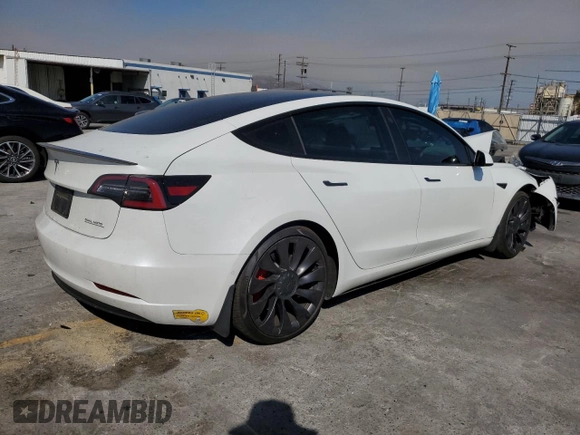 2021 Tesla Model 3 Performance z VIN 5YJ3E1EC1MF075451, wystawiony jako Copart lot #60354235 z przebiegiem 52 662 mil mil oraz Szkoda całkowita • Salvage title. Historia ofert i sprzedaży dostępna na DreamBid. Obrazek 3.