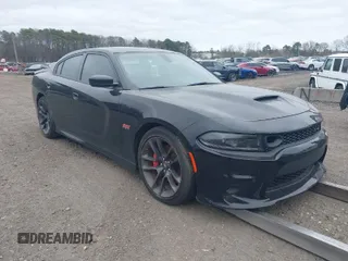 2022 Dodge Charger Scat Pack Widebody with VIN 2C3CDXGJ5NH194380, listed as a IAAI auction lot 38148418 with 21,653 mi miles and . Bid and sale history available at carsss.com. Image 1.