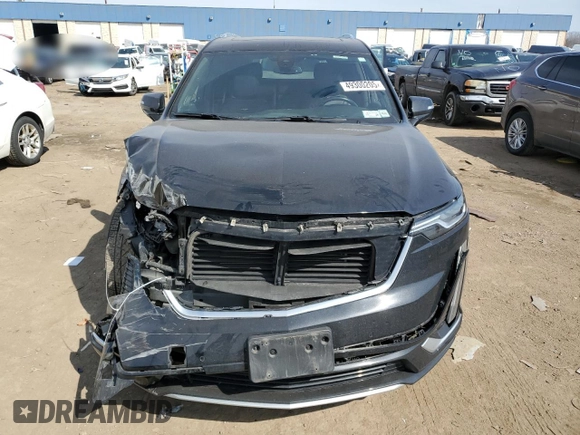 2023 Cadillac XT6 FWD Premium Luxury with VIN 1GYKPCRS4PZ103061, listed as a Copart auction lot 49300205 with 72,131 mi miles and Salvage title. Bid and sale history available at DreamBid. Image 5.