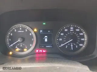 2018 Hyundai Tucson Value with VIN KM8J3CA28JU648236, listed as a IAAI auction lot 41161221 with 104,057 mi miles. Bid and sale history available at carsss.com. Image 7.