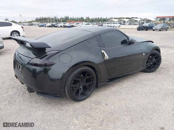 2020 Nissan 370Z Coupe Sport Touring with VIN JN1AZ4EH4LM822624, listed as a IAAI auction lot 41347754 with 30996 miles. Bid and sale history available at carsss.com. Image 4.