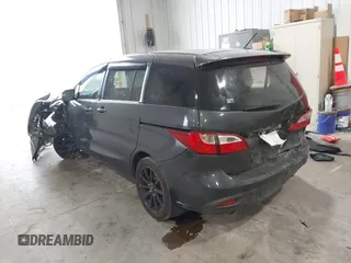 2014 Mazda 5 Sport z VIN JM1CW2BLXE0164748, wystawiony jako IAAI lot #42064606 z przebiegiem 140 169 mil mil oraz . Historia ofert i sprzedaży dostępna na DreamBid. Obrazek 3.