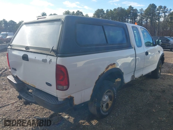 2003 Ford F-150 XL with VIN 2FTRX18W43CA62452, listed as a IAAI auction lot 41497879 with 125,828 mi miles. Bid and sale history available at carsss.com. Image 4.