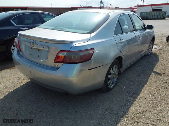 2007 Toyota Camry CE with VIN JTNBE46K773058525, listed as a IAAI auction lot 41927357 with 245,984 mi miles. Bid and sale history available at carsss.com. Image 4.