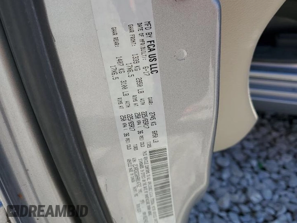 2017 Dodge Grand Caravan SXT with VIN 2C4RDGCG0HR814762, listed as a Copart auction lot 51769485 with 98,166 mi miles and Salvage Title. Bid and sale history available at DreamBid. Image 13.