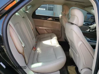 2016 Lincoln MKZ z VIN 3LN6L2J95GR629768, wystawiony jako Copart lot #49098085 z przebiegiem 116 365 mil mil oraz Szkoda całkowita • Salvage title. Historia ofert i sprzedaży dostępna na DreamBid. Obrazek 10.