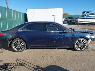 2017 Lincoln Continental Reserve z VIN 1LN6L9NC9H5609249, wystawiony jako IAAI lot #40685968 z przebiegiem 103 051 mil mil oraz . Historia ofert i sprzedaży dostępna na DreamBid. Obrazek 14.
