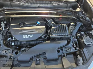 2017 BMW X1 xDrive28i with VIN WBXHT3C32H5F79305, listed as a Copart auction lot 54665865 with 113,046 mi miles and Clean Title. Bid and sale history available at carsss.com. Image 7.