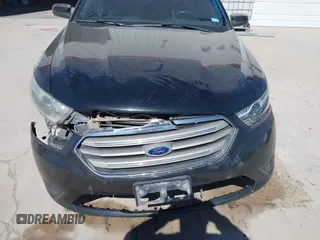 2014 Ford Taurus SEL with VIN 1FAHP2E83EG184976, listed as a IAAI auction lot 41590153 with 177,342 mi miles. Bid and sale history available at carsss.com. Image 6.