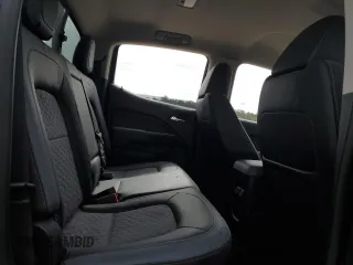 2016 Chevrolet Colorado 4WD Z71 z VIN 1GCGTDE37G1112427, wystawiony jako Copart lot #70180404 z przebiegiem Nie podano mil oraz Szkoda całkowita • Salvage title. Historia ofert i sprzedaży dostępna na DreamBid. Obrazek 11.