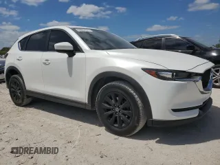 2018 Mazda CX-5 Sport with VIN JM3KFBBM2J0330444, listed as a Copart auction lot 53057675 with 121,747 mi miles and Clean Title. Bid and sale history available at carsss.com. Image 4.