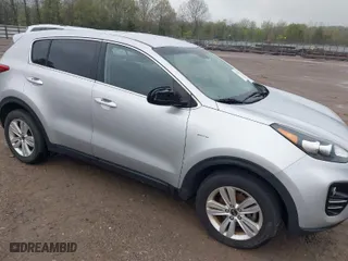 2017 Kia Sportage LX with VIN KNDPMCAC1H7140218, listed as a IAAI auction lot 42024024 with 129,799 mi miles. Bid and sale history available at carsss.com. Image 6.