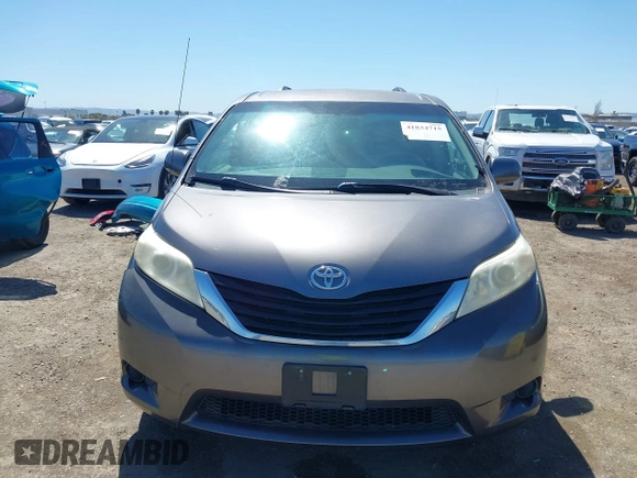2011 Toyota Sienna LE AAS with VIN 5TDKK3DC0BS055346, listed as a IAAI auction lot 41834715 with 124,847 mi miles. Bid and sale history available at carsss.com. Image 12.