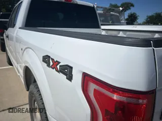 2017 Ford F-150 XL z VIN 1FTEX1E86HFA13205, wystawiony jako IAAI lot #42363763 z przebiegiem 165 117 mil mil oraz . Historia ofert i sprzedaży dostępna na DreamBid. Obrazek 1.