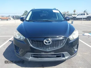 2014 Mazda CX-5 Sport z VIN JM3KE2BE8E0371775, wystawiony jako IAAI lot #42111417 z przebiegiem 150 932 mil mil oraz . Historia ofert i sprzedaży dostępna na DreamBid. Obrazek 12.