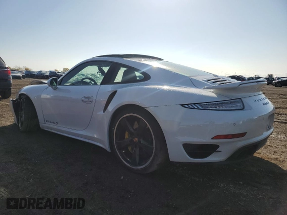 2015 Porsche 911 Turbo S with VIN WP0AD2A9XFS160370, listed as a Copart auction lot 77165054 with 19,235 mi miles and Salvage Title. Bid and sale history available at DreamBid. Image 2.