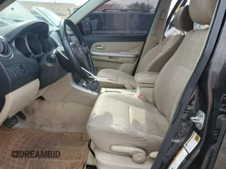 2013 Suzuki Grand Vitara z VIN JS3TE0D44D4100033, wystawiony jako Copart lot #51648665 z przebiegiem 151 879 mil mil oraz Czysty tytuł • Clean title. Historia ofert i sprzedaży dostępna na DreamBid. Obrazek 7.