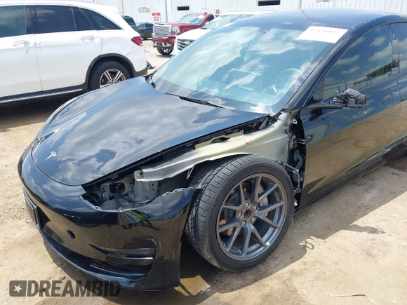2023 Tesla Model 3 with VIN 5YJ3E1EA8PF454210, listed as a IAAI auction lot 42326822 with 43,200 mi miles and . Bid and sale history available at DreamBid. Image 6.