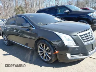 2013 Cadillac XTS Luxury with VIN 2G61R5S33D9184878, listed as a IAAI auction lot 41644213 with 113,293 mi miles. Bid and sale history available at carsss.com. Image 1.