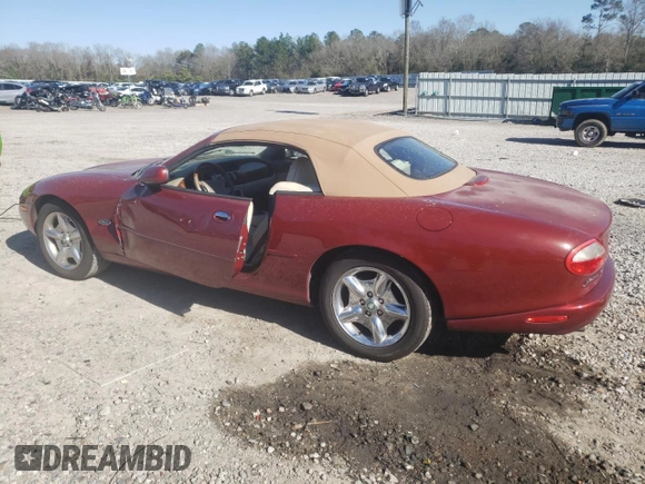 1999 Jaguar XK z VIN SAJGX2043XC032962, wystawiony jako Copart lot #49312155 z przebiegiem 74 662 mil mil oraz Szkoda całkowita • Salvage title. Historia ofert i sprzedaży dostępna na DreamBid. Obrazek 2.