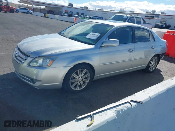 2007 Toyota Avalon XL with VIN 4T1BK36B57U223906, listed as a IAAI auction lot 41591096 with 190,659 mi miles. Bid and sale history available at carsss.com. Image 2.