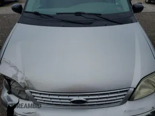 2003 Ford Windstar LX z VIN 2FMZA51433BA70321, wystawiony jako Copart lot #77114094 z przebiegiem 125 267 mil mil oraz Szkoda całkowita • Salvage title. Historia ofert i sprzedaży dostępna na DreamBid. Obrazek 12.