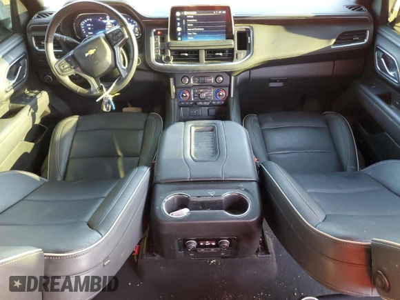 2022 Chevrolet Suburban Premier with VIN 1GNSKFKT7NR242288, listed as a Copart auction lot 79420734 with 77,006 mi miles and Salvage Title. Bid and sale history available at DreamBid. Image 8.