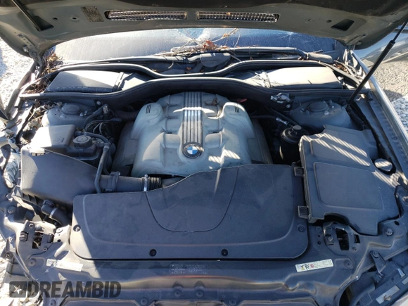 2004 BMW 7 Series 745Li z VIN WBAGN63514DS55343, wystawiony jako Copart lot #75668824 z przebiegiem 153 909 mil mil oraz Szkoda całkowita • Salvage title. Historia ofert i sprzedaży dostępna na DreamBid. Obrazek 11.