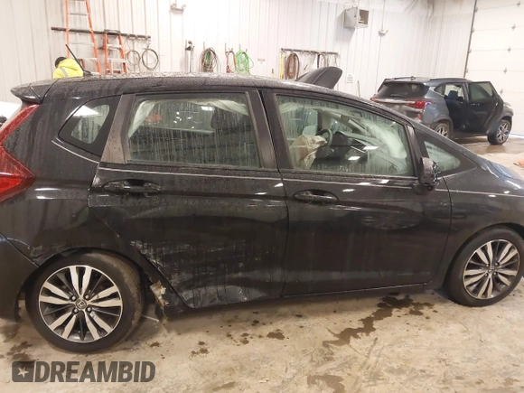 2015 Honda Fit EX-L with VIN 3HGGK5H84FM700823, listed as a IAAI auction lot 41488377 with 116,988 mi miles. Bid and sale history available at carsss.com. Image 13.
