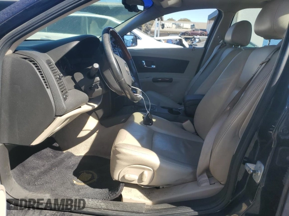 2003 Cadillac CTS with VIN 1G6DM57N330163561, listed as a Copart auction lot 77894164 with 167,868 mi miles and Clean Title. Bid and sale history available at carsss.com. Image 7.