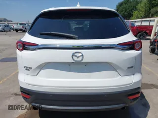 2019 Mazda CX-9 Touring z VIN JM3TCBCY2K0300702, wystawiony jako IAAI lot #42194050 z przebiegiem 98 247 mil mil oraz . Historia ofert i sprzedaży dostępna na DreamBid. Obrazek 16.