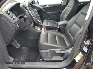 2017 Volkswagen Tiguan S with VIN WVGBV7AX8HK007434, listed as a Copart auction lot 53706165 with 164,588 mi miles and Salvage Title. Bid and sale history available at DreamBid. Image 7.