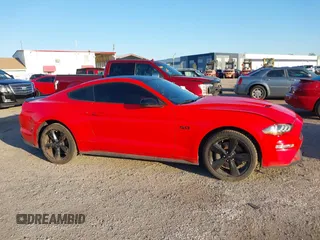 2021 Ford Mustang GT with VIN 1FA6P8CF8M5102178, listed as a IAAI auction lot 41996175 with 76,540 mi miles and . Bid and sale history available at DreamBid. Image 14.