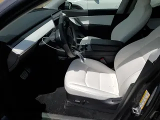 2021 Tesla Model Y Performance with VIN 5YJYGDEF0MF137692, listed as a Copart auction lot 55333395 with 56,325 mi miles and Salvage Title. Bid and sale history available at DreamBid. Image 7.