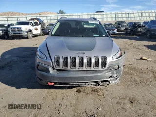 2018 Jeep Cherokee Trailhawk with VIN 1C4PJMBB9JD571773, listed as a Copart auction lot 82876514 with 137,565 mi miles and Salvage title. Bid and sale history available at DreamBid. Image 5.