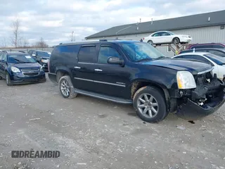 2012 GMC Yukon XL Denali with VIN 1GKS2MEF7CR200790, listed as a IAAI auction lot 41215279 with 147,663 mi miles. Bid and sale history available at carsss.com. Image 13.