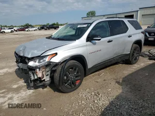 2020 Chevrolet Traverse Premier z VIN 1GNERKKW3LJ291107, wystawiony jako Copart lot #56363315 z przebiegiem 74 464 mil mil oraz Szkoda całkowita • Salvage title. Historia ofert i sprzedaży dostępna na DreamBid. Obrazek 1.