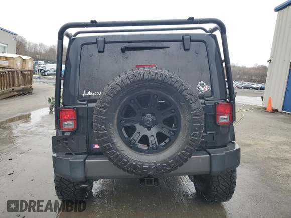 2017 Jeep Wrangler Sport z VIN 1C4AJWAG4HL563093, wystawiony jako Copart lot #51603125 z przebiegiem 105 618 mil mil oraz Szkoda całkowita • Salvage title. Historia ofert i sprzedaży dostępna na DreamBid. Obrazek 6.
