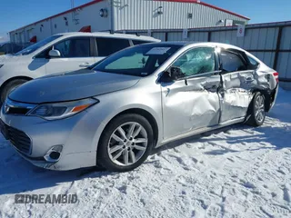 2013 Toyota Avalon XLE with VIN 4T1BK1EBXDU009947, listed as a IAAI auction lot 41562857 with 174,764 mi miles and . Bid and sale history available at DreamBid. Image 2.