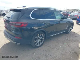2023 BMW X5 xDrive40i with VIN 5UXCR6C00P9R56116, listed as a IAAI auction lot 41504795 with 39,425 mi miles. Bid and sale history available at carsss.com. Image 4.