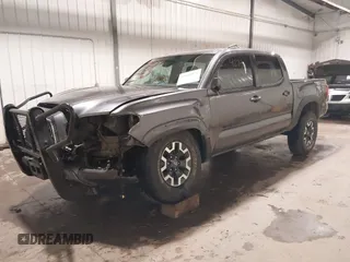 2019 Toyota Tacoma SR with VIN 5TFCZ5AN7KX208672, listed as a IAAI auction lot 42143071 with 83,584 mi miles and . Bid and sale history available at DreamBid. Image 19.