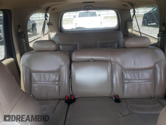 2000 Ford Excursion Limited with VIN 1FMNU42L1YEC61687, listed as a Copart auction lot 67590714 with 219,386 mi miles and Salvage title. Bid and sale history available at DreamBid. Image 9.