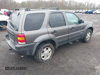 2002 Ford Escape XLT Choice with VIN 1FMYU04122KC36937, listed as a IAAI auction lot 42014887 with 141,885 mi miles. Bid and sale history available at carsss.com. Image 4.