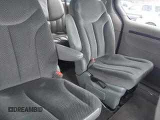 1999 Chrysler Town & Country with VIN 1C4GT64L7XB723937, listed as a IAAI auction lot 41609957 with 242,800 mi miles and . Bid and sale history available at DreamBid. Image 8.
