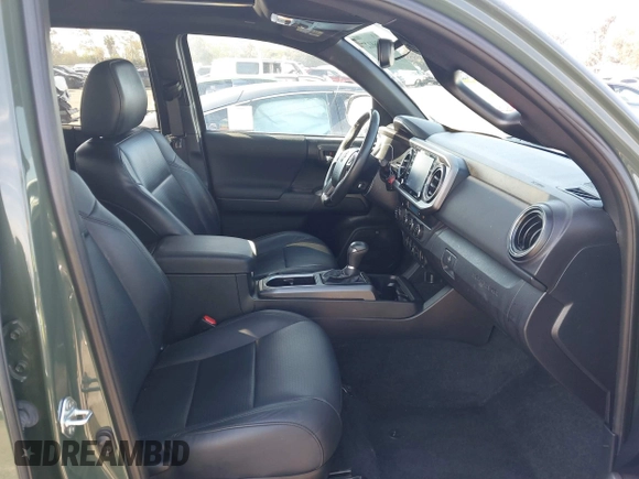 2021 Toyota Tacoma SR z VIN 3TMCZ5AN7MM395940, wystawiony jako IAAI lot #41860127 z przebiegiem 39 338 mil mil oraz . Historia ofert i sprzedaży dostępna na DreamBid. Obrazek 5.