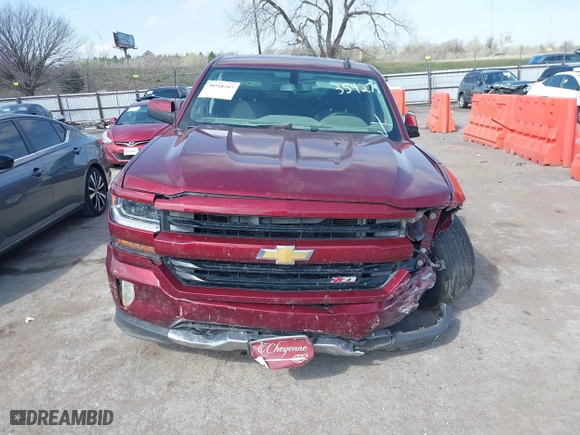 2016 Chevrolet Silverado 1500 LT with VIN 3GCUKREC0GG354271, listed as a IAAI auction lot 38948207 with 130,369 mi miles. Bid and sale history available at carsss.com. Image 12.