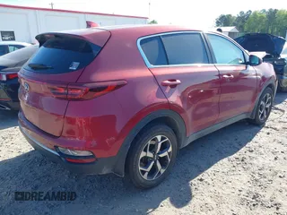 2020 Kia Sportage LX with VIN KNDPM3AC5L7733492, listed as a IAAI auction lot 42042055 with 109,345 mi miles and . Bid and sale history available at DreamBid. Image 4.