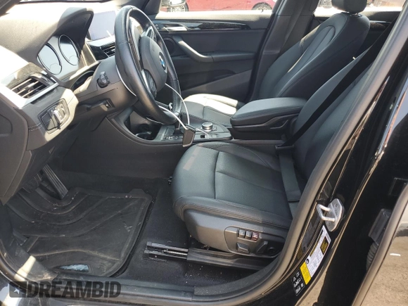 2021 BMW X1 xDrive28i with VIN WBXJG9C06M5S33201, listed as a Copart auction lot 66391015 with 53,395 mi miles and Salvage title. Bid and sale history available at DreamBid. Image 7.
